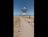 Man lie down desert satellite dish station