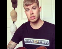 Guy plays guitar, pretends to sing but screams, dad tells him to shut up