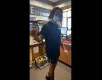 Worker dances to music at work