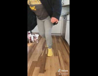 Yellow socks girl runs from puppies kitchen 
