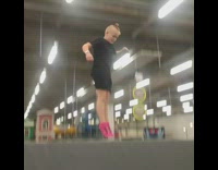 guy black outfit pink shoes blue trampoline