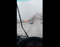 Vehicle burn on expressway while raining