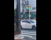 Cyclist balance barrel of trash on head