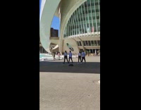 Five people white shirt group dance park