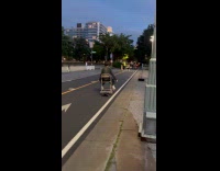 Collab WINY - Guy sit on chair ride electric skateboard