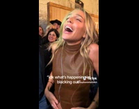 Collab ClipsIG - Woman brown leather top makes deep breath