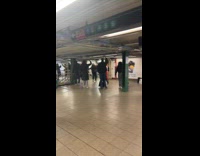 People sings and dance at subway station
