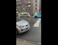 2 guys in santa hats direct traffic 