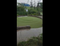 Guy plays mini golf starts raining