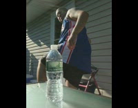 Man in blue Sixers jersey does the bottle cap challenge, kung fu fighting song