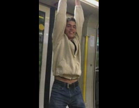 a guy does a pull up and hits head on bar