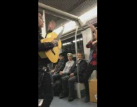 Mohawk Guy Sings Spanish Song on Subway