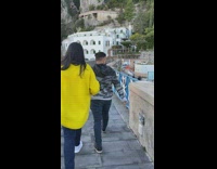 Girl pretends to push guy gets scared 