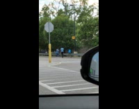 Three employee of a market tiktok dance at the parking lot