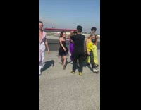 Five people fashion dress airplane model walk