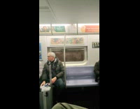 Man bring and lay on crib inside train