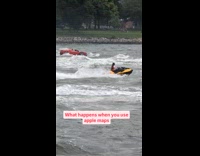 Guy rides customized boat car on river
