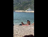 Collab IITW - Woman lie down sideways at beach shore