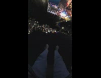 POV of person riding on a slingshot carnival ride 
