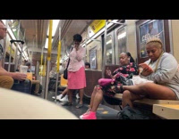 Two people fight woman preacher inside train