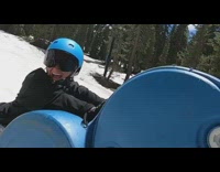 Woman jumps onto blue barrel ramp and scorpions after skis fall off feet