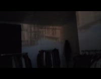 Buildings projected upside down in room through hole