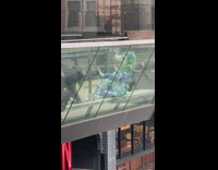 Person makes blue green art 