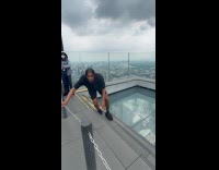 Man scared of glass floor 
