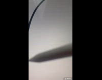 Guy draws caillou in hospital bed tablet