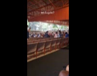 Woman take picture of other photographer theatre