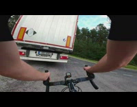 Guy rides bicycle keeps up white truck 