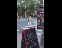 White pants person shoots bubbles green gun 