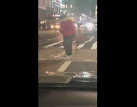 Guy taking video steam from manhole