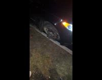 Broken car rim flies at camera