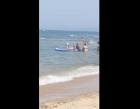 Woman lay on board beach high heels