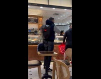 Man wearing LED backpack