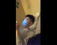 Two guys face masks black plug earrings 