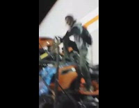 Guy lawnmower on rack jumps off fail