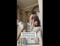 Collab BitchIG2 - Guy carrying white blanket up stairs