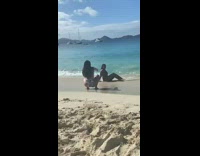 Collab IITW - Woman bikini sit beach hit by waves