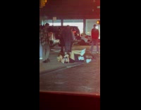 Two women lay on street bicycle kicks
