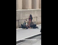 Model poses with ropes and 3 guys bowing 