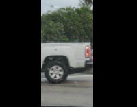 Woman bikini swim on flood water street