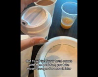 Woman shows hack putting sausage on coffee cup