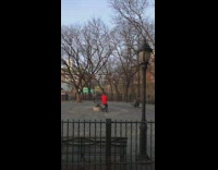 Guy circles globe statue sculpture 