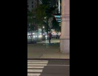 Couple ride together on Onewheel board night