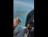 Man in Airplane Puts Hand Out Window