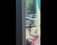 Collab IITW - Woman does tiktok dance at the docks 