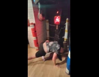 Man punches boxing sack falls on floor