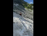 Collab SendItOfficiall - Red backpack girl slides down snow mountain 